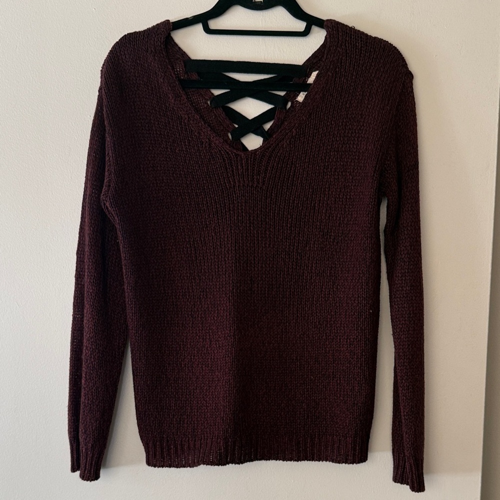 Elegant V-Neck Sweater with Crisscross Detail